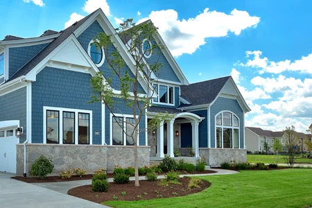 house with a green lawn